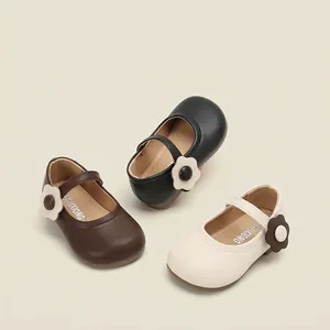 Elegant toddler girl's leather Mary Jane shoes featuring a cute side flower ornament