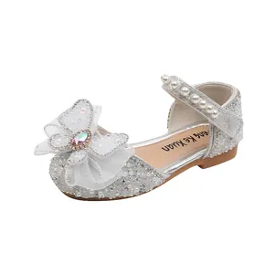 Sparkling silver princess shoes for young girls with elegant bow and pearl strap