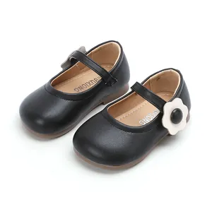 Classic black faux leather Mary Jane shoes for toddler girls with elegant white flower