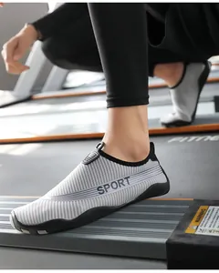 Breathable lightweight fitness yoga shoes for men and women on treadmill gym background