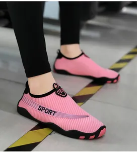 Detailed view of pink breathable water shoes with non-slip soft sole for outdoor