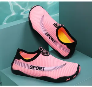 Detailed side view of pink and black breathable wading shoes with non-slip soft sole