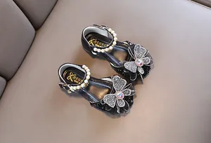 Zapatos de fiesta princesa negros para niñas con correas de perlas y lazos brillantes