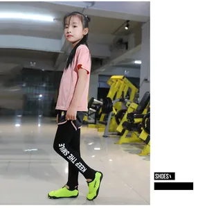 A young girl wearing lime green breathable wading shoes in a professional gym setting