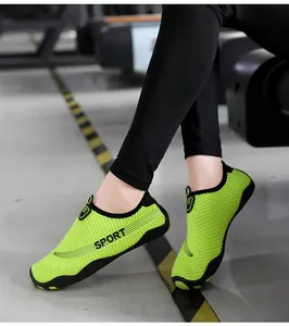 Side detail of neon green breathable water shoes for yoga and outdoor activities