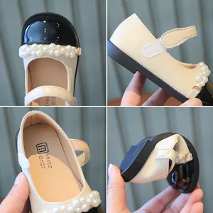 Zapatos Mary Jane vintage para niña con perlas y puntera de charol negro elegante