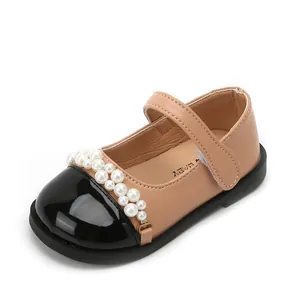 Elegantes zapatos Mary Jane de princesa para niñas con perlas y puntera negra