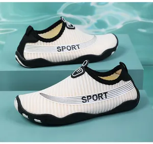 Close-up detail of breathable striped water shoes with non-slip rubber sole and SPORT logo