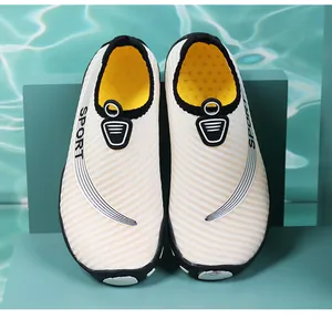 Close-up of white breathable water shoes with diagonal stripes and anti-slip rubber soles