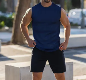 Close-up detail of men's blue slim fit ribbed knit tank top for fitness and running sports