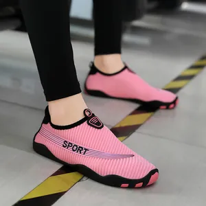 Breathable pink aqua shoes for couples featuring non-slip soft soles for outdoor sports