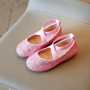 Pink glitter princess shoes for girls with elastic cross straps for dance.