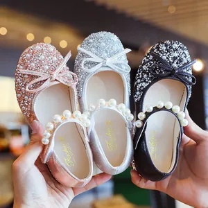 Sparkling girls' princess dress shoes with bows and pearls in pink, silver, and black