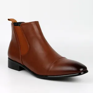 Polished brown leather Chelsea boot with an elastic side panel and burnished toe detail