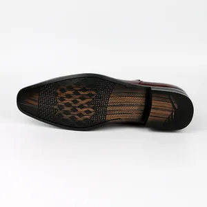 Detail view of the vintage Chelsea boot's durable wood-grain patterned sole.