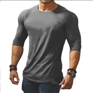 Detailed view of the slim fit grey round neck sports t-shirt showing fabric texture