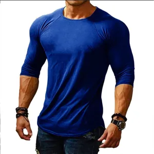Detailed view of royal blue slim fit long sleeve T-shirt for men with muscular build