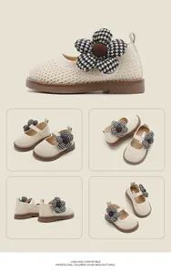 Detail views of knit baby shoes featuring a large black and white houndstooth flower