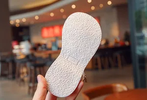 Close-up view of the non-slip soft sole texture for girls' summer Roman sandals