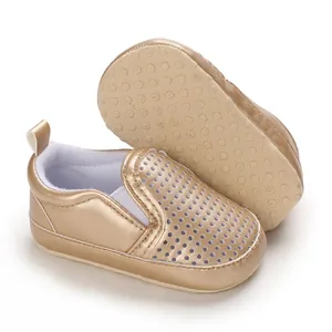 Gold PU soft leather infant pre-walker shoes with anti-slip sole and perforated design.