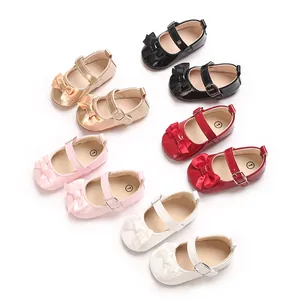 Selection of colorful baby girl Mary Jane shoes with bows and glossy finish
