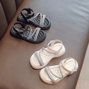 Stylish girls' Roman sandals with sparkly rhinestone straps in black and white colors