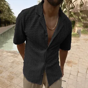 Macro view of men's hollow knit shirt showing intricate wave texture and lapel detail