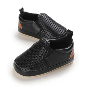 Premium soft black PU leather baby loafers with perforated design for ages zero to one