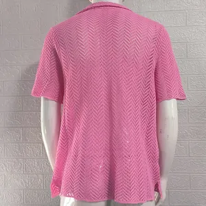 Rear view detail showing the intricate hollow-out knit pattern of a pink men's shirt