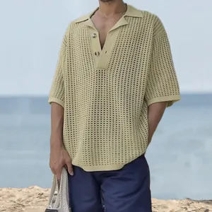 Close-up of men's hollow-out knit polo shirt with stylish lapel and short sleeves.