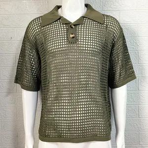 Detailed close-up view of olive green hollow-out knit polo shirt on white mannequin