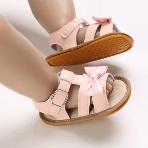 Pink baby girl summer sandals with bow detail and non-slip rubber sole for walkers