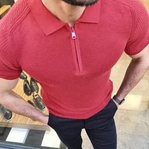 Close-up detail of a men's red slim fit knitted polo shirt with a stylish zipper collar