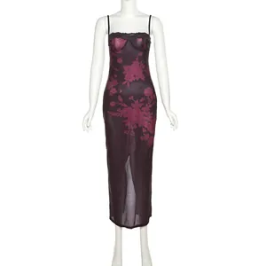 Vintage floral print midi dress with lace trim and sexy spaghetti straps on mannequin.