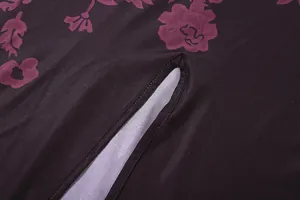 Detailed close-up showing floral print and high-quality slit finish on retro slim dress