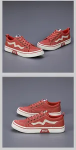 Detailed side view of stylish red low-top canvas sneakers with white wavy patterns
