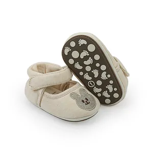 Detailed view of breathable anti-slip baby walking shoes featuring cute bunny embroidery