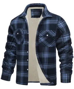 Close-up detail of the thick warm beige fleece lining inside a blue plaid men's jacket