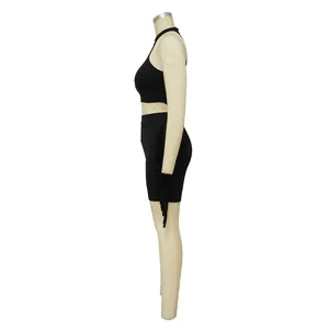 Side view detail of black sleeveless top and matching fringe skirt casual two-piece set