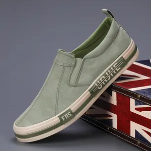Stylish men's green canvas slip-on loafers with camo pattern for casual autumn wear