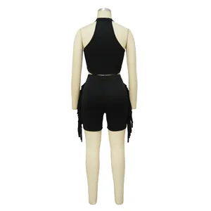 Back view detail of sleeveless black crop top and fringe shorts set on mannequin