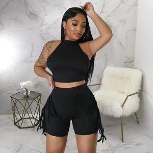 Detailed view of women's black sleeveless fringe two-piece casual set