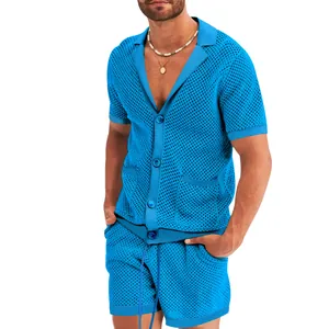 Macro detail of men's blue hollow-out mesh shirt and shorts set for summer wear.