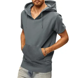 Close-up view of a casual grey men's short sleeve hoodie with kangaroo pocket detail