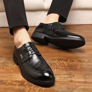 Elegant black men's formal business leather shoes with premium hand-grabbed texture.