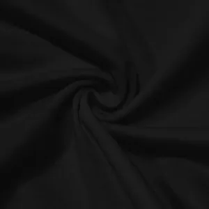 Detailed close-up view of soft breathable black athletic fabric texture with spiral folds