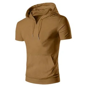 Detailed view of men's short-sleeved hooded sweatshirt in mustard yellow with pocket