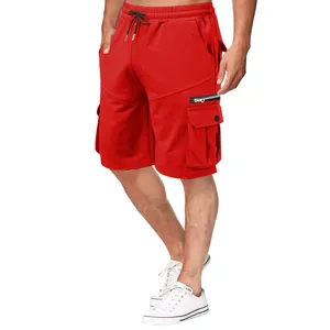 Close-up of red cotton cargo shorts with functional multi-pockets and zipper detail