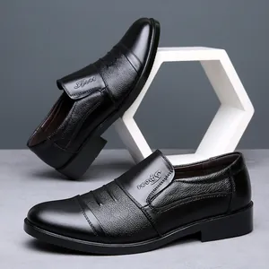 Close-up of men's black genuine leather business shoes with elegant texture detail