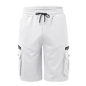 Front view of white men's cargo shorts with black drawstring and multiple utility pockets